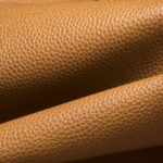 leather with moody lighting to show the highlights and shadows